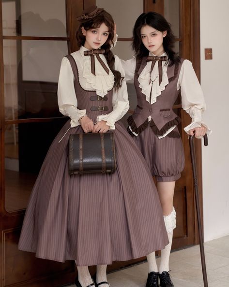 ✨ Vintage British Charm Meets Steam Era Elegance! Brass buttons and retro striped brown fabric bring the steam era to life. 👗 Pair the underbust JSK, blouse, and cape for a graceful lady look, or 👑 Opt for the waistcoat and bloomer set for a dashing little prince style. Short dress full set 21% off now only $77.00, search "WITHP-509" on devilinspired.com to shop! Long dress full set 17% off now only $89.50, search "WITHP-508". Ouji full set 17% off now 89.50, search "WITHP-510". #vintagevibe... 1870s Fashion, Hat Brooch, Lolita Outfits, Classic Lolita, Brooch Necklace, Striped Fabric, Lolita Dress, Lolita Fashion, British Style