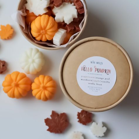 Embrace the joy of the season with "Hello Pumpkin" Wax Melts. Experience the delightful scents of freshly zested orange peel, spiced peppercorn, and the mouthwatering aromas of apple and mandarin. Let the soothing essence of vanilla and the sweetness of tonka bean uplift your senses and create an atmosphere that celebrates the magic of fall. Fall Wax Melts, Wax Melts Packaging, Fall Ornaments, Orange Apple, Fall Stuff, Candle Ideas, Tree Candle, Autumn Inspired, Hello Pumpkin