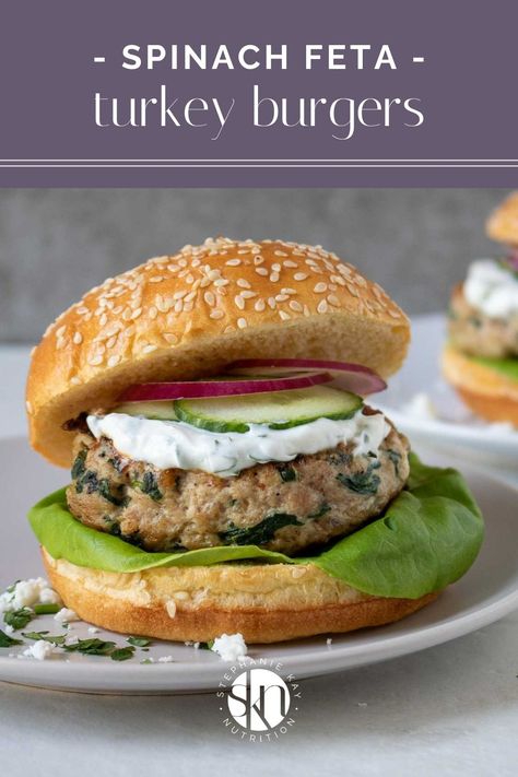 Healthy turkey burgers! Made with spinach, feta, and topped with yogurt sauce, these spinach feta turkey burgers are full of Greek flavors. Healthy Turkey Burgers, Spinach Feta Turkey Burgers, Healthy Burger Recipes, Healthy Burger, Turkey Burger Recipes, Spinach Feta, Healthy Turkey, Greek Flavors, Turkey Burger