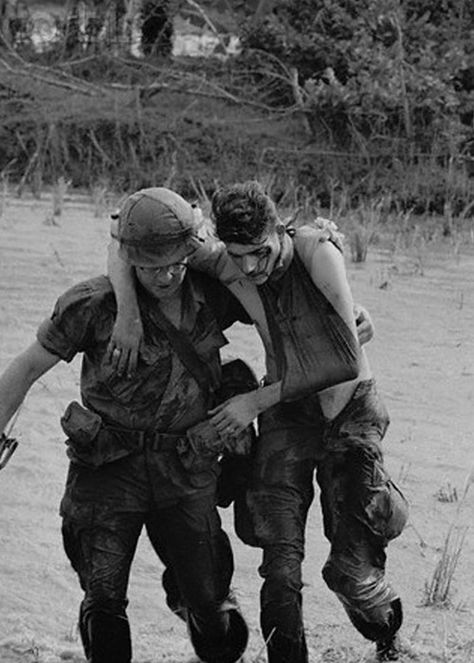 The Jungle War - February 22-May 14, 1967 - Junction City ends with 2728 Viet Cong killed and 34 captured. American losses are 282 killed and 1576 wounded. NVA relocate their Central Office headquarters inside Cambodia, thus avoiding capture - A wounded 9th division soldier, whose body was booby trapped by the Communists, is helped to safety after the traps were removed. He was injured during fighting in the Mekong Delta area. Injured Soldier, Wounded Soldier, Office Headquarters, Junction City, Vietnam History, Vietnam Vets, Mekong Delta, North Vietnam, South Vietnam