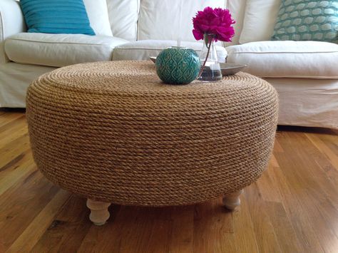 My tire and rope coffee table is DONE! I LOVE the way this came out. It's just as awesome as the $600+ abaca coffee table I was eyeing and it only cost about $70 for the rope, glue, and plywood. The tire was free from Les Schwab! Rope Ottoman, Tire Ottoman, Tire Table, Diy Ottoman, Old Tires, Coastal Living Rooms, Coastal Bedrooms, Rope Crafts, Nautical Home