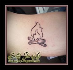 campfire logs fire outline simple linework black tattoo kamloops dolly's skin art Fire Aries Tattoo For Women, Small Campfire Tattoo, Kindle Tattoo, Campfire Tattoo Simple, Campfire Tattoos, Ember Tattoo, Log Tattoo, Bonfire Tattoo, Fire Outline