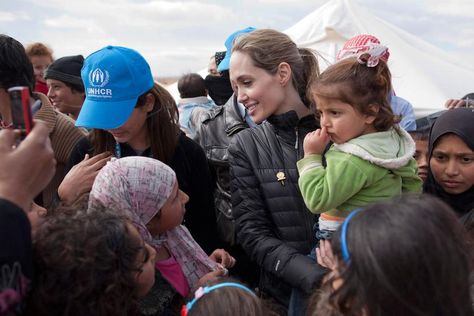 Angelina Jolie meets with refugees at the Zaatari refugee camp on Dec. 6, 2012 outside of Mafraq, Jordan. Vivienne Marcheline Jolie Pitt, Angelina Jolie Style, Jonny Lee Miller, Brad Pitt And Angelina Jolie, Angelina Jolie Photos, Humanitarian Work, Mia Farrow, Jolie Pitt