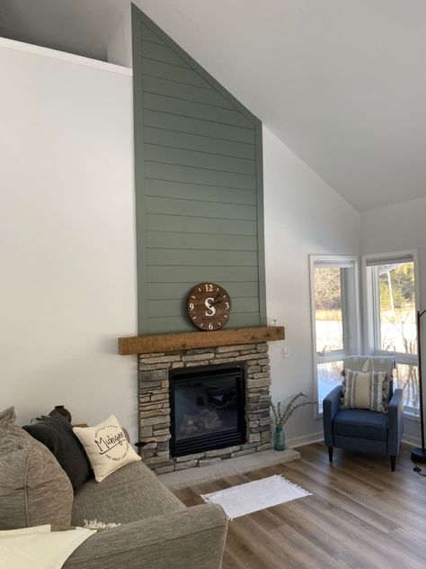 Painted Shiplap. Paint color: Behr Village Green, lightened by 20% #shiplap #fireplace #greenshiplap #homeupdates Accent Color On Fireplace Wall, Painted Shiplap Living Room, Green Shiplap Fireplace Wall, Dark Green Shiplap Fireplace, Sage Green Shiplap, Green Shiplap Wall Living Room, Sage Fireplace Wall, Green Wall Fireplace, Colored Shiplap Fireplace