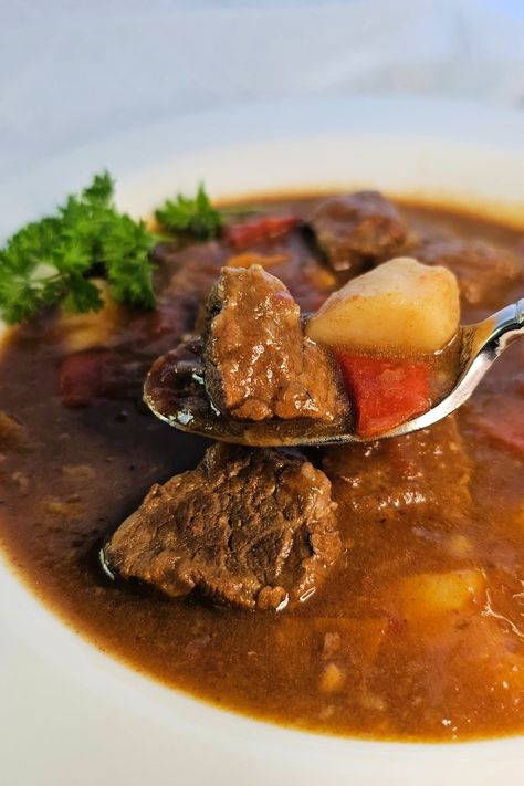 German goulash soup recipe: Authentic Gulaschsuppe with tender beef and rich flavors. This hearty, adapted Hungarian dish offers comforting warmth in every spoonful. German Beef Recipes, German Goulash Recipes, Beef Goulash Soup, German Goulash, Goulash Soup, German Dishes, Food Authentic, German Food Authentic, German Foods