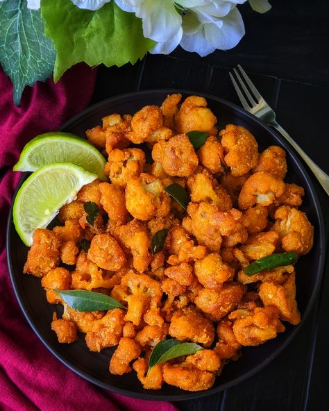 This Gobi 65 or Cauliflower 65 is a delicious veg appetizer in which the spicy layered cauliflower are fried to crisp and golden and tossed in a flavored spice that makes it better than restaurant one! Gobi 65 Recipe, Gobi Fry, Gobi 65, Veg Appetizers, Flavored Rice, Green Chutney, Fried Cauliflower, India Food, Cauliflower Recipes