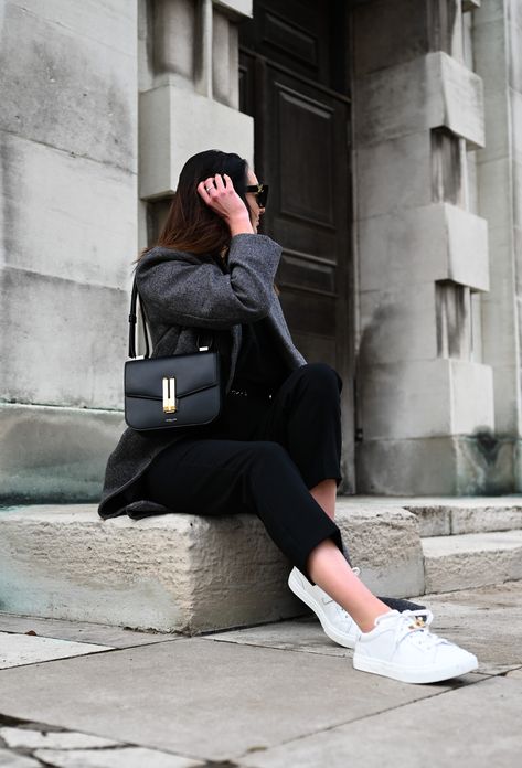 Wearing the Vancouver cross-body bag in black smooth leather as the vocal point for the look. Pair tapered trousers with the Weekday wood blend coat to emphasize its silhouette. Add details such as the Lily Silk gold and black leather belt as well as some black cat eye sunglasses to elevate the look. #DeMellierLondon #DeMellierBag #TheVancouverBag #Blackbag #LuxuryHandbag #LuxuryStyling #OOTD Designer Work Bag, Top Designer Bags, Black Designer Bags, Luxury Crossbody, Black Cat Eye Sunglasses, Luxury Gifts For Her, Black Cat Eyes, Tapered Trousers, Designer Crossbody Bags