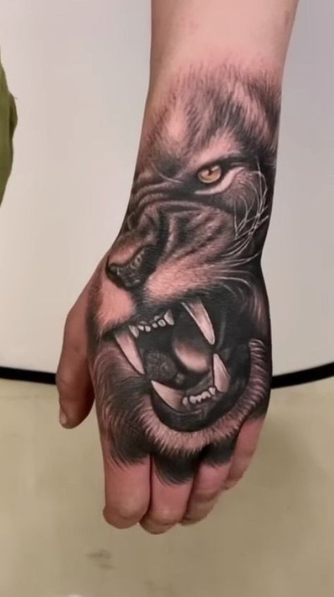 Men’s Hand Tattoos Lion, Lion On Hand Tattoo, Lion Tattoo Hand, Justin Tattoo, Lion Hand Tattoo, Unique Hand Tattoos, Cute Tattoo Ideas, Hand Tattoo Designs, Bird Tattoos For Women