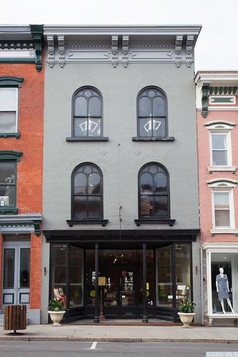 Light Brick House Exterior Dark Trim, Historic Building Renovation, Barbershop Exterior, Cute Store Fronts, Boutique Exterior Store Fronts, Brick Retail Facade, Downtown Building Exterior, Painted Brick Downtown Building, Stucco And Brick Exterior