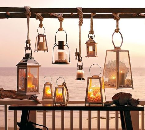 Love this lighting idea, BUT, not blocking the water view, maybe to the side of the porch or something. Old Ladders Repurposed, Woodland Reception, Hanging Outdoor Decor, Porch Transformation, Repurposed Ladders, Patio Lanterns, Lanterns Hanging, Lantern Hanging, Lantern Decor