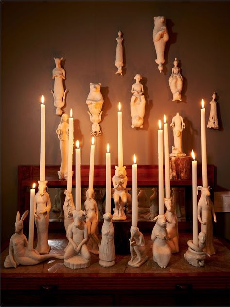 Sacred Space: Han Feng's home sculptural ceramic candle altar. Robin Whiteman’s ceramic figures and candle holders have pride of place on a wall by the kitchen. Candle Shrine, Wall Shrines, Library Garden, Movable Walls, Nyc Tours, Sliding Wall, Candle Altar, Fear And Loathing, Books Library