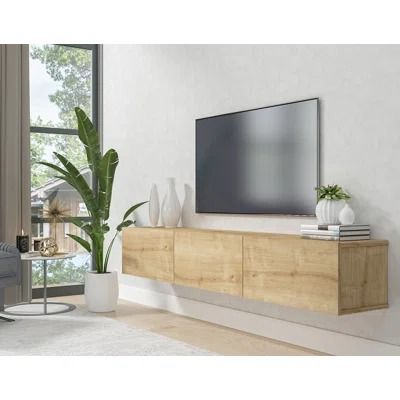 Wrought Studio™ Kaniala Sideboard | Wayfair Wall Mounted Media Console, Tv Console Cabinet, Floating Tv Stand, Floating Tv, Cool Tv Stands, House Color Schemes, Tv Stands And Entertainment Centers, Wall Mounted Tv, Media Console