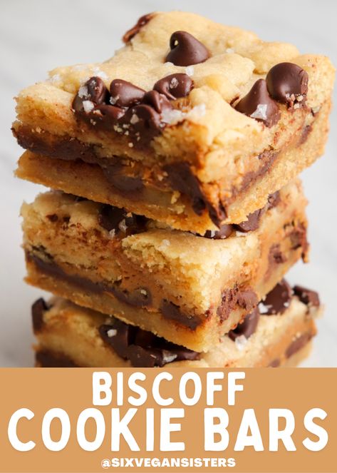 These cookie bars are soft, chewy, and layered with chocolate and Biscoff cookie butter for an explosion of flavor. Add a sprinkle of flaky sea salt for the ultimate sweet and salty treat. #vegan #veganrecipe #sixvegansisters #vegancookies #biscoff #cookies #cookiebars Vegan Speculoos Cookies, Vegan Biscoff Dessert, Biscoff Vegan Recipes, Vegan Biscoff Cookies, Vegan Biscoff Recipes, Cookie Butter Bars, Six Vegan Sisters, Biscoff Cookie Recipe, Autumn Desserts