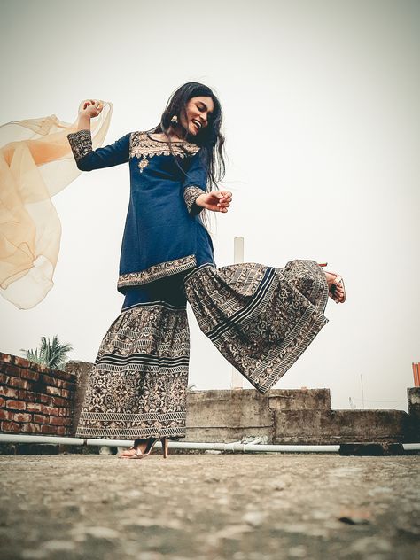 Sharara, Eid dress, photoshoot idea, pose idea, photography idea Photoshoot Ideas In Sharara, Sharara Photoshoot, Photoshoot Indian Wear, Eid Photo Shoot Ideas, Poses For Sharara, Sharara Poses At Home, Garara Dress Photo Poses, Eid Photography Ideas, Sharara Dress Poses