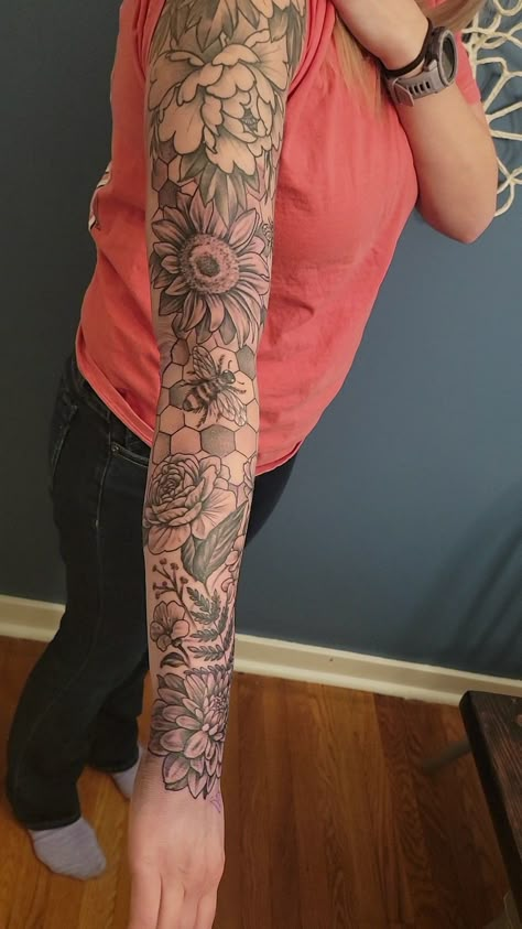 Different Flower Sleeve Tattoo, Flower Sleeve Ideas, Fullsleeve Tattoos For Women, Books Tattoo Sleeve, Honeycomb Sleeve Filler, Half Sleeve Filler Tattoos For Women, Floral Sleeve Tattoo With Bees, Large Tattoos For Women Arm, Background For Tattoos Sleeve