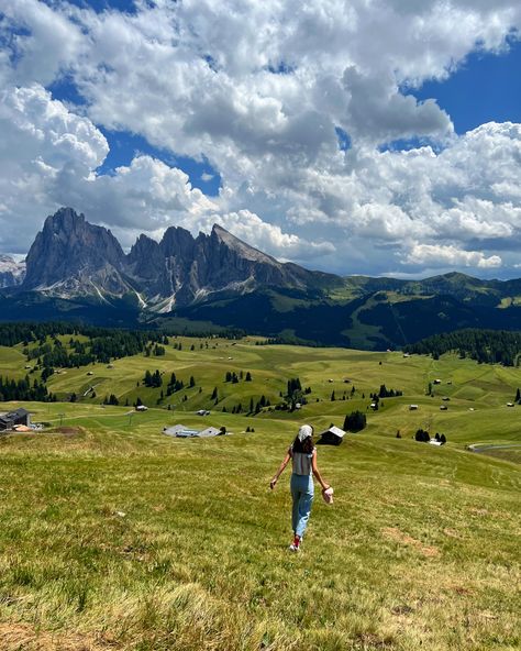 Girl hiking running in the hills near mountain Dolomintes The Alps Italy Italian Vacation Hike Dolomites Hiking Outfit, Italian Dolomites Hiking, Italian Dolomites Summer, The Dolomites Italy, Hiking Dolomites Italy, Ortisei Italy, Dolomites Aesthetic, Dolomites Hiking, Hiking Places