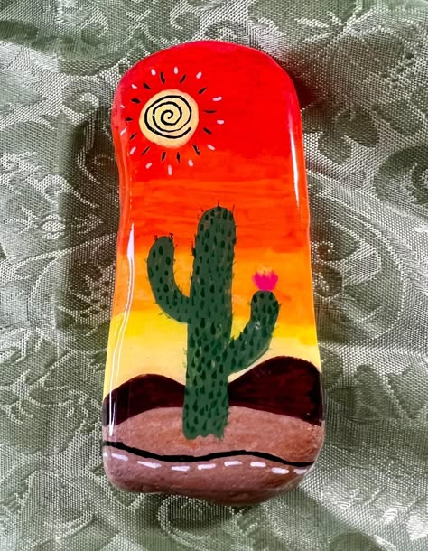 Desert Rock Painting, Cactus Rocks Painted, Cactus Rock Painting, Arizona Painted Rocks, Desert Painted Rocks, Painted Rock Cactus Garden, Painting Rocks To Look Like Cactus, Stone Cactus Diy Painted Rocks, Stone Painting Cactus Rock Art