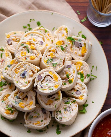 Mexican inspired Tortilla Pinwheels are flour tortillas that are wrapped around a cheesy mixture loaded with chiles, green onions, black beans, corn, jalapeno peppers, and taco seasoning. Tortilla Pinwheels, Mexican Pinwheels, Pinwheel Recipes, Appetizers, i am homesteader, iamhomesteader, recipes Recipes Using Flour, Cheesy Bacon Chicken, Cream Cheese Pinwheels, Tortilla Pinwheels, Tuna Recipe, Recipes With Flour Tortillas, Homemade Flour Tortillas, Roll Ups Tortilla, Pinwheel Recipes