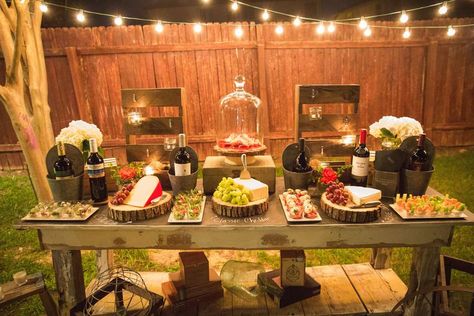 How great is this food table at a rustic outdoor party! See more party ideas at CatchMyParty.com! Outdoor Themed Birthday Party For Adults, Rustic Birthday Decorations For Men, Backyard Rustic Party, 50th Bbq Birthday Party Ideas For Men, Outdoor Birthday Party Decorations For Men, Rustic Party Decor Birthday Men, Rustic Birthday Party Ideas For Men, Small Backyard Birthday Party For Adults, 30th Birthday Bbq For Men