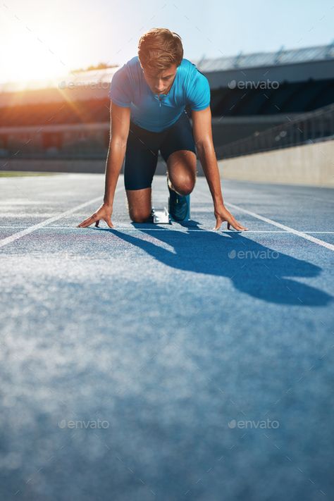 Professional male track athlete in starting blocks by jacoblund. Professional male track athlete in set position on sprinting blocks of an athletics running track in stadium.#athlete, #starting, #blocks, #Professional Track Senior Pictures, Running Pose, Confident Man, Track Runners, Field Athletes, Workout Pics, Running Photos, Running Track, Portrait Photography Men