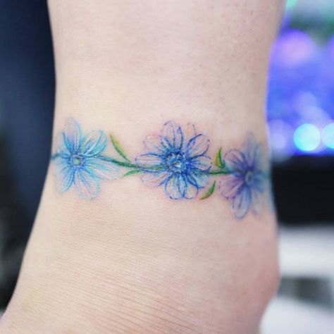 101 Best Anklet Tattoo Ideas You'll Have To See To Believe! 13 Outsons Charm Anklet Tattoo, Charm Bracelet Tattoo, Anklet Tattoos For Women, Colorful Flower Tattoo, First Time Tattoos, Cute Anklets, Butterfly Anklet, Ankle Bracelet Tattoo, Anklet Tattoos