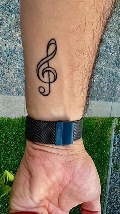 Hand Music Tattoo, Manly Music Tattoos, G Music Note Tattoo, Treble Clef Tattoo Men, Music Symbol Tattoo Men, G Key Tattoo, Music Back Tattoo, Small Music Related Tattoos, Tato Music