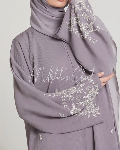 This stunning luxury abaya is crafted from imported zoom fabric, offering an elegant and sophisticated look. The abaya features intricate handwork on the sleeves, adding a touch of glamour and artistry. Designed for convenience and style, it includes a front-open design with a Button closure, making it both fashionable and functional. This abaya is the perfect choice for weddings or any special occasion, combining tradition with modern elegance to create a truly beautiful ensemble. Not... Zoom Fabric Abaya, Luxury Abaya Design, Abaya With Buttons, Abaya Fashion Modern, Abayas Designs, Elegant Abayas, Beautiful Abaya Designs, Luxury Abaya, Eid Abaya