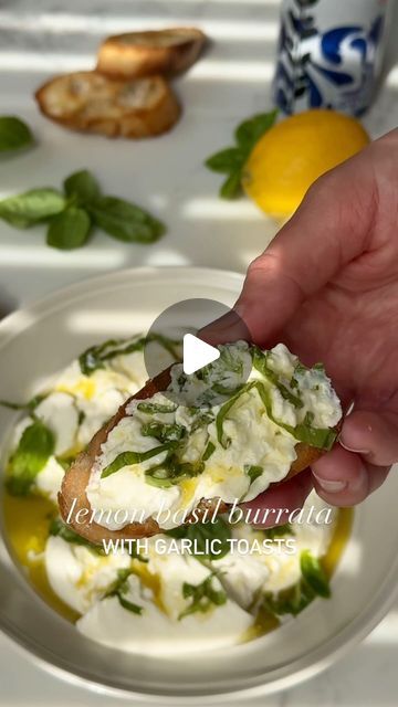 Feta Topalu on Instagram: "Your weekend is begging to finish off with this lemon basil infused burrata with crunchy garlic toast. 🍋🌱

Lemon Basil Burrata w Garlic Toasts:

Ingredients:
8 oz burrata cheese
3 tablespoons olive oil divided
1 tablespoon fresh basil sliced
1 lemon, zested and squeezed
1 baguette,sliced
1 clove garlic, halved

Detailed recipe on the blog! Fettysfoodblog.com 💛

#burrata #appetizer #burratacheese #burrataappetizer" Lemon Basil Burrata With Garlic Toast, Buratta Appetizer Cold, Summer Appetizers For Party, Garlic Toasts, Burrata Appetizer, Pesto Appetizers, Crunchy Garlic, Burrata Recipe, Garlic Toast