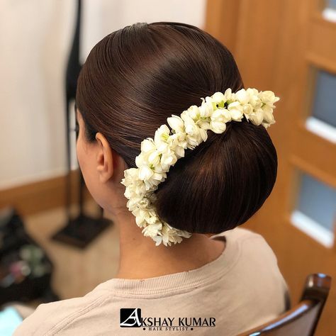 🎵ANOTHER ONE🎵 Sleek buns and fresh flowers will ALWAYS be a favourite  Hair by @akshaykumarhairstylist… Sleek Bun With Flowers, Bridal Buns Indian, Flower Gajra, Sleek Buns, Sleek Bun Hairstyles, Hairstyle Images, Hair Style On Saree, Neck Tie Knots, Bridal Bun