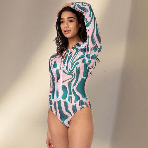 UPF clothing provides extra sun protection on top of SPF, but tends to lack in style. Here, we've rounded up 15 UPF clothing pieces that are actually cool. Fun One Piece Swimsuit, Upf Clothing, Sun Protective Clothing, Long Sleeve Swimsuit, Clothing Pieces, Sustainable Fabric, Lightweight Dress, Versatile Dresses, Sleeveless Jumpsuits