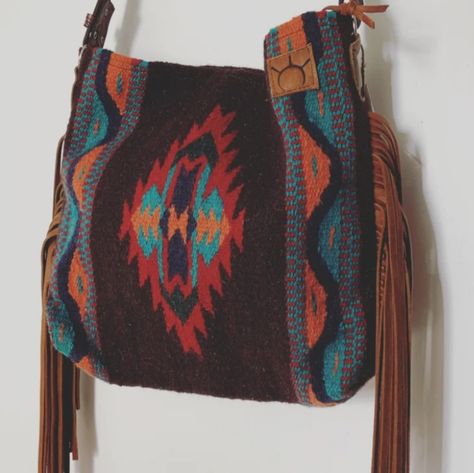 Western Saddle Blanket Bag 1515 Handmade Buy Sweetgrass Leather. Leather Fringe Crossbody Strap. Colors Are Brown,Red, Turquoise,Blue, And Orange. Zipper Closure With 2 Pockets Inside. Perfect Statement Piece For Any Outfit. No Longer Made One Of A Kind. Western Bags, Blanket Bag, Western Bag, Saddle Blanket, Western Saddle, Red Turquoise, Leather Fringe, Blue And Orange, Turquoise Blue