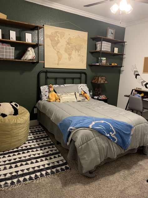 Re-designed bedroom for 8 year old boy! Shelves, bedding, bean bag from Amazon Headboard from Wayfair Rug, shelving decor, map from Hobby Lobby Desk from Wayfair Desk chair from Target Paint is Evergreen by PPG Paints #outdoorroom #boysbedroom #greenwall #wildernessroom #worldroom #boysroom #target #wayfair #hobbylobby #map Boys Bedroom Bed, Shelves For Boys Bedroom, Boy Bedroom Shelves, Wall Shelves Boys Bedroom, Boys Bedroom Double Bed, Full Size Bed For Boys, Boy Desk In Bedroom, Neutral Teen Boy Room, Teen Boy Bedroom Paint Ideas