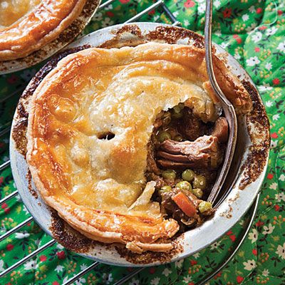 Steak and Stilton Pies --  The Fall season = Comfort Food!!  This homemade "beef pot pie" sounds incredibly delicious!  Sauté chunky onions, celery, carrots, then add a bottle of stout and steam. Add beef, mushrooms and peas, divide between individual pie pans and top with a puff pastry crust.  Wow! Kidney Pie, Savory Pastries, Stilton Cheese, Beef Pot Pies, Homemade Pies, Medieval Recipes, British Cooking, Puff Pastry Crust, Individual Pies