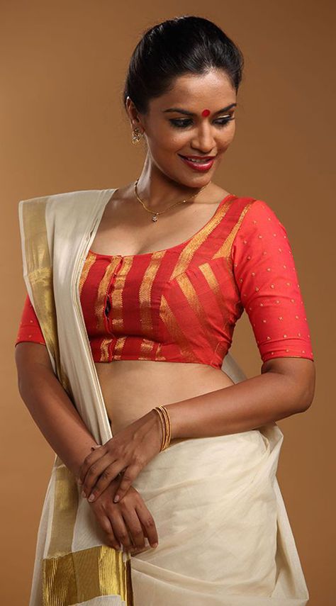 Orange And Gold Color Blouse With Front Semi U Shape Neckline Kerala Kasavu Saree, Kasavu Saree, Patchwork Blouse, Traditional Indian Dress, Saree Blouse Patterns, Saree Models, Blouse Design Models, Saree Look, Blouse Online