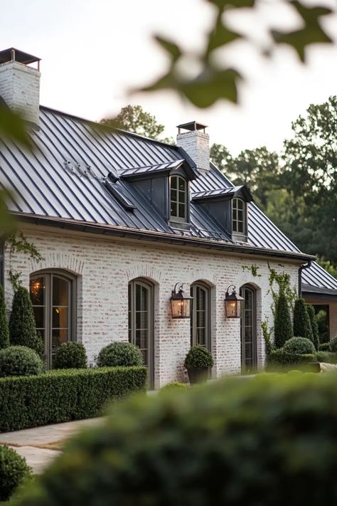 Effortlessly Chic: 40 French Country Homes You’ll Want to Move Into | VIVA Modern French Provincial Exterior, French Brick House, Brick French Country Exterior, Parisian Home Exterior, Modern French House Exterior, Brick Cottage Exterior, French Acadian Style Homes, Modern French Style Home, Modern French Country Exterior