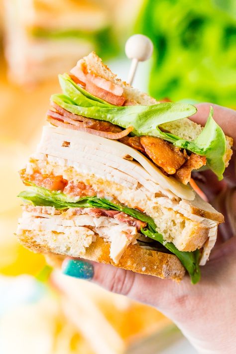 This Club Sandwich Recipe is an easy and classic sandwich made with hickory smoked turkey breast, Swiss cheese, thick-cut bacon, lettuce, tomato, and mayonnaise. Turkey Club Sandwich Recipes, Club Sandwich Recipe, Turkey Club Sandwich, Club Sandwich Recipes, Low Carb Sandwiches, Bacon Lettuce Tomato, Turkey Club, Smoked Turkey Breast, Light Dinner Recipes