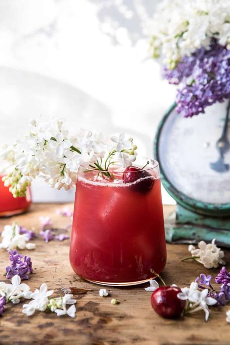 Sweet summer cherries, hibiscus, lemon, and a splash of vodka come together to make this refreshing pitcher cocktail. It's delicious, pretty, and perfect for warm summer days or nights. Try serving this up at your next summer party! Summer Solstice Party, Easter Cocktails, Pitcher Drinks, Roti Bakar, Pitcher Cocktails, Solstice Party, Cherry Vodka, The Longest Day, Cocktail And Mocktail