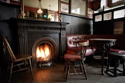 Nothing says winter in Ireland like the blazing fireplace in an Irish pub. Speakeasy Fireplace, English Pub Interior Design, Pub Fireplace, Irish Pub Interior, Irish Pub Design, Winter Fireplace Decor, Cozy Pub, Cosy Pub, Winter Fireplace