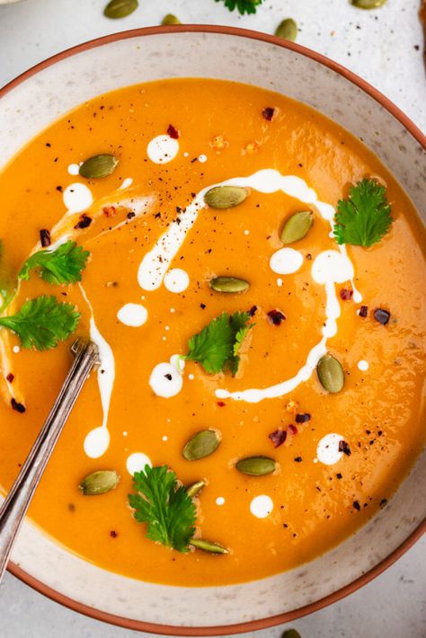 Pumpkin and sweet potato soup served in a bowl topped with a drizzle of cream, cilantro and pumpkin seeds. Pumpkin Sweet Potato Soup, Chilli Soup, Healthy Vegetarian Breakfast, Carrot And Lentil Soup, Sweet Potato Soup Recipes, Red Pepper Soup, Pumpkin Soup Recipe, Pasta Side Dishes, Pasta Sides