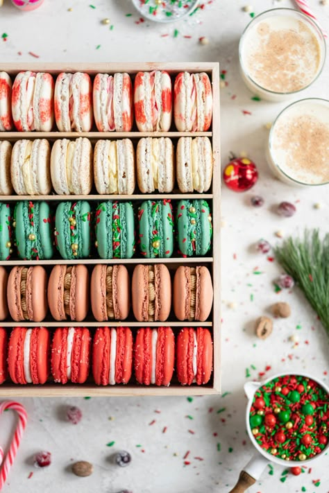 The Ultimate Christmas Macaron box - a cute, gluten free twist on the traditional cookie box. This cookie box is filled with the flavours of christmas - Candy Cane, Eggnog, Christmasfetti, Gingerbread, and cranberry. Each macaron is filled with a delicious complementary filling - ranging from american buttercream to German buttercream. This macaron box would make the perfect homemade gift. Grab the recipes now! Christmas Macaron, Cloudy Kitchen, Macaron Ideas, Kue Macaroon, Christmas Macarons, Macaron Recipes, Macaron Boxes, Macaron Flavors, Macaron Cookies