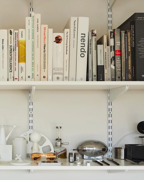 Our new issue hits newsstands on Tuesday. In anticipation, we’re taking a look back at some of our favorite stories from May/June issues past, like this Brooklyn apartment. – A floor-to-ceiling peg board covered in tools and treasures; a wardrobe slung from 11-foot ceilings with a pulley system to lower it; simple track shelving suspended over a bed that holds more than 150 books and 200-some-odd items collected and created: These are the innovations of Joshua Skirtich (@joshuaskirtich), a 25... Track Shelving, Odd Items, Pulley System, Brooklyn Apartment, Peg Board, Looking Back, Brooklyn, Track, Take That