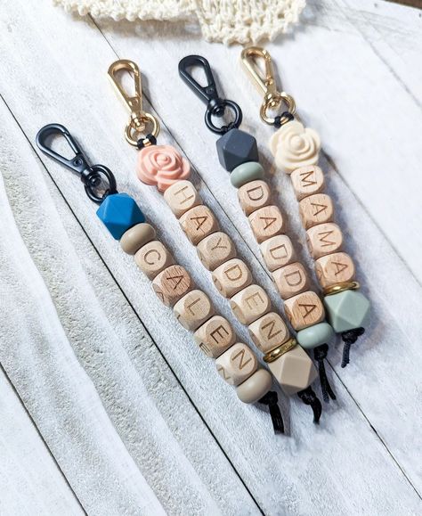 ✨A look at a recent custom keychain order Did you know we create personalized name keychains? With a vast variety of color and print beads, along with black or white silicone letter beads, and neutral beechwood options, the possibilities for crafting something truly unique are nearly endless! . . . #ldnont #londonontario #strathroyontario #woodstockontario #handmadegifts #siliconebeadscanada Handmade beaded accessories Silicone bead keychain wristlet Name Keychains, Silicone Bead Keychain, Bead Accessories, Bead Keychain, Keychain Wristlet, Wristlet Keychain, Letter Beads, Beaded Keychains, Beaded Accessories