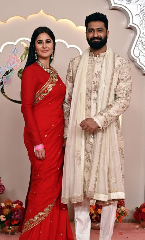 MUMBAI, INDIA - JULY 12:   Indian actor Vicky Kaushal and wife Katrina Kaif attended the Wedding ceremony of Anant Ambani and Radhika Merchant at the Jio World Convention Centre, BKC on July 12, 2024 in Mumbai, India.  (Photo by Raju Shinde/Hindustan Times via Getty Images) Indian Wedding Outfits Guest, Anant Ambani And Radhika Merchant, Wedding Guests Photos, Radhika Merchant, Anant Ambani, Indian Wedding Clothes For Men, Draping Styles, Vicky Kaushal, Men's Wedding Outfit