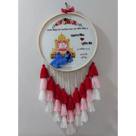 Sikh Wedding Hoop with Tassels Dm for Customization HOOP ART BY ROZEN [Wedding Hoop, Sikh Wedding Hoop, Wedding Gifts, Handmade, Embroidery Hoop Art] #embroideryhoopart #hoopart #handcrafted #handmade #weddinghoop #sikhweddinghoop #embroideryhoopwithtassels #dmfororders #customisedgifts Hoopart Embroidery Wedding, Wedding Hoop Embroidery, Marriage Embroidery, Wedding Gifts Handmade, Sikh Couple, Wedding Embroidery Hoop, Hoop Art Wall, Embroidered Wall Art, Wedding Hoop