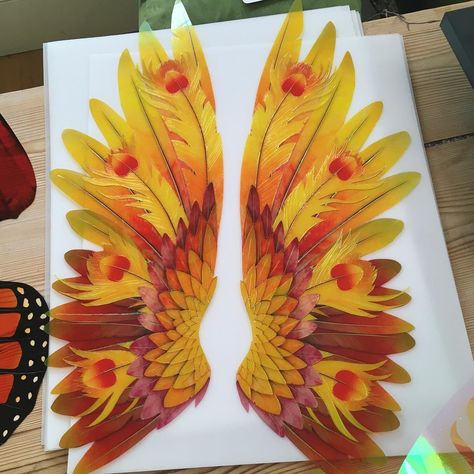 evised Phoenix wings in progress. Flame 🔥 on. #phoenix #photoshoot #fantasy #wings #workinprogress #iridescent #shimmer #phoenixfeather Phoenix Photoshoot, Fantasy Wings, Phoenix Costume, Phoenix Wings, Phoenix Feather, Mythical Birds, Diy Costumes, Phoenix, Art