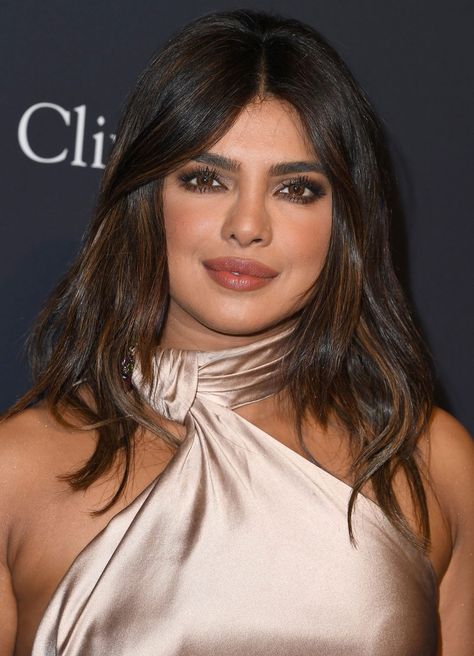 Priyanka Chopra's New Bangs Are the Perfect Hair Upgrade for Fall Dark Brown Hair With Caramel, Dark Brown Hair With Caramel Highlights, Brown Hair With Caramel, Brown Hair With Caramel Highlights, Highlights Ideas, Celebrity Hair Colors, Caramel Hair, Caramel Highlights, Dark Brown Hair Color