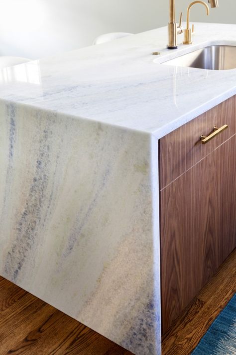 Quartz Waterfall Countertop with wood & gold fixtures Walnut Kitchen Island, Petite Kitchen, Waterfall Countertop, Kitchen Island Tops, Kitchen Renovation Inspiration, Waterfall Island, Walnut Kitchen, Island Countertops, Amazing Kitchen