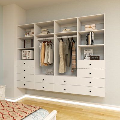 This white modular closet system with drawers is made of solid manufactured wood which comes with high-quality eco-friendly materials and white finishes. Our wall-mounted designed closet organizer and storage system, which is perfect for walk-in closets and any reach-in areas, allows you to maximize storage space and leverage vertical space in your home. With 8 fixed closet shelves, 12 full extension drawers and 2 sturdy hanging rads, our wood closet organizer system kit unit provides plenty of Wall Mounted Wardrobe Design, Dutton House, Closet System With Drawers, Modular Closet System, Compact Laundry Room, Elegant Laundry Room, Stairs Bedroom, Wood Closet Organizers, Modular Closet