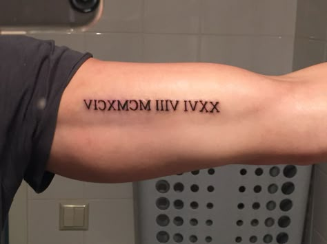 Roman Numeral Tattoo Men Bicep, Roman Number Tattoo Men, Bicep Roman Numeral Tattoo, Roman Numeral Tattoo Bicep, Tattoo Ideas Kids, Mens Roman Numeral Tattoo, Roman Number Tattoo, 1987 Tattoo, Roman Numeral Tattoo Men