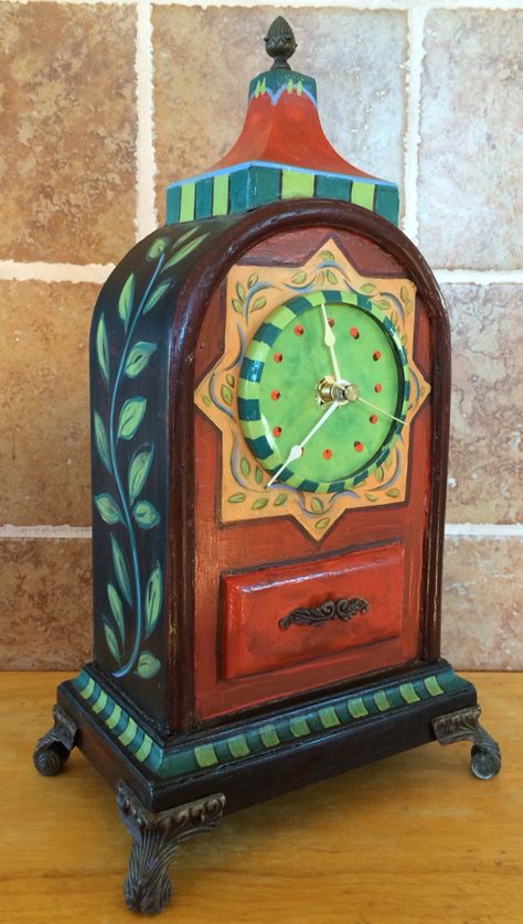 Hand painted clock by Katy Bratun. Acrylic paint on thrifted clock. Pottery Clock, Painted Clocks, Gesso Art, Clock Making, Folk Decor, Clock Painting, Whimsical Furniture, Pottery Houses, Carriage Clocks